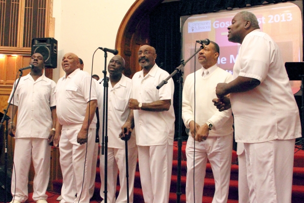 Members of the Men In White Choir performing at Community Missions' 2013 Gospel Fest Concert.
